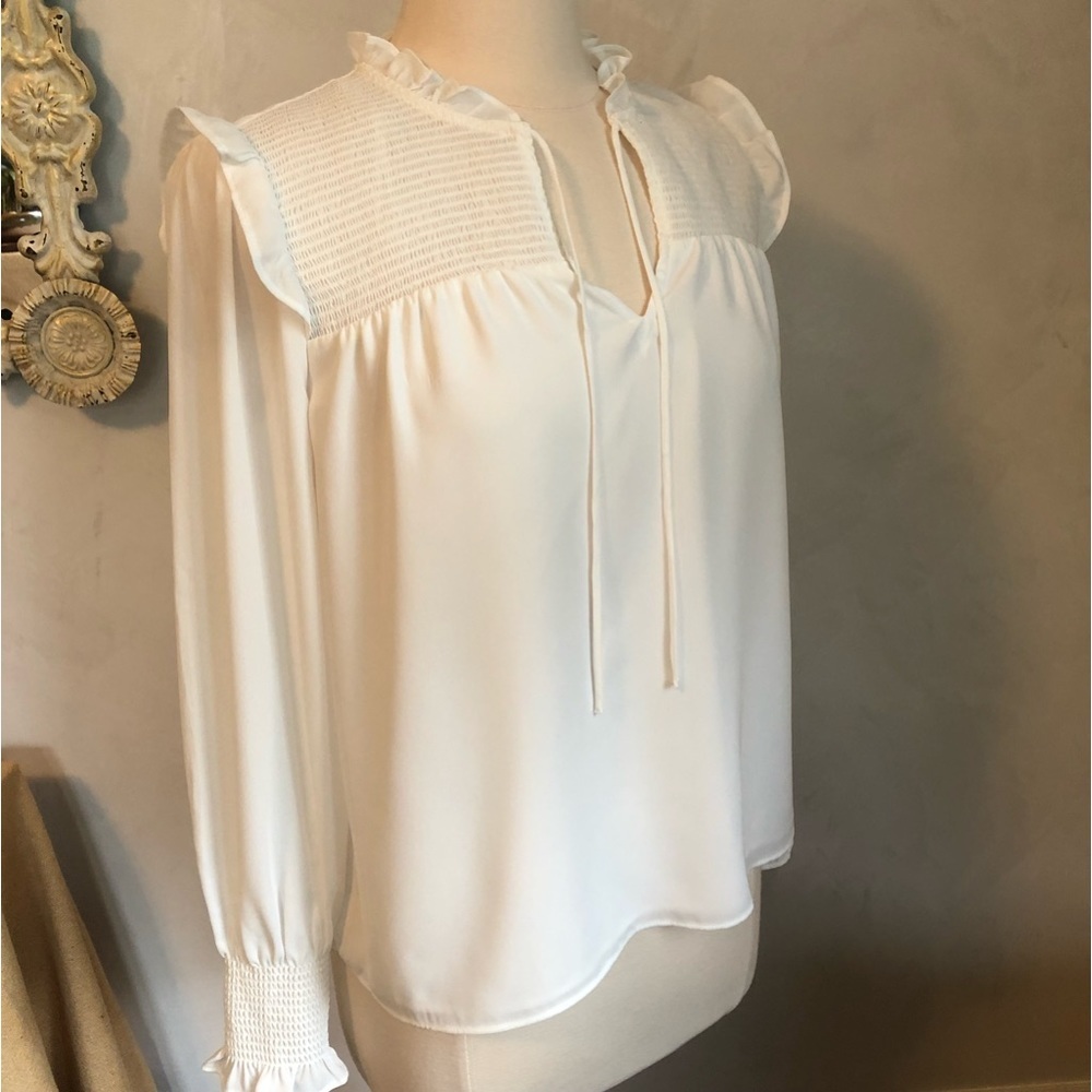 CeCe ivory bohemian style blouse w/tie neck,long sleeves w/smocked cuffs size XS
